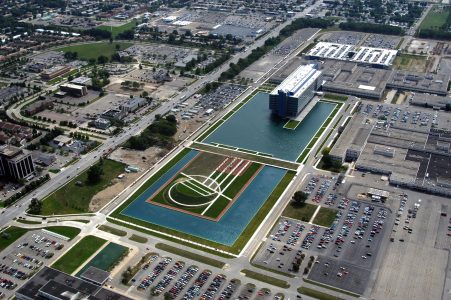 Aerial shot of General Motors Corp Vehicle Engineering Center and lake