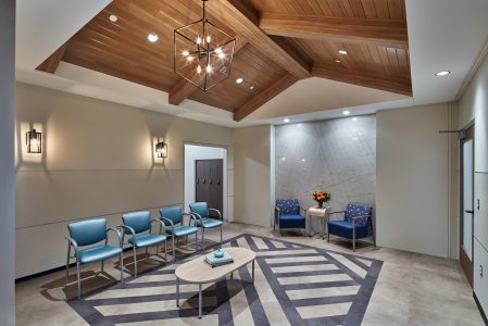 Karmanos Cancer Institute gowned waiting room used for patients who have been prepped for surgery.